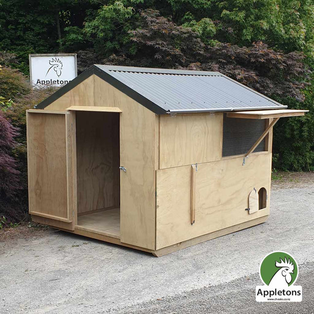 Appletons apex timber rabbit house featuring removable external shutters