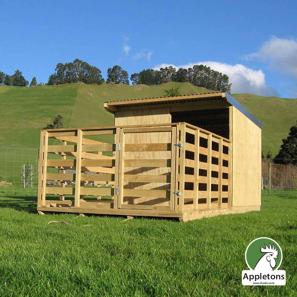 Appletons Farrowing Pigsty and Pen is built on skids and a solid deck with hinged pen gate and secure twin bolt latches