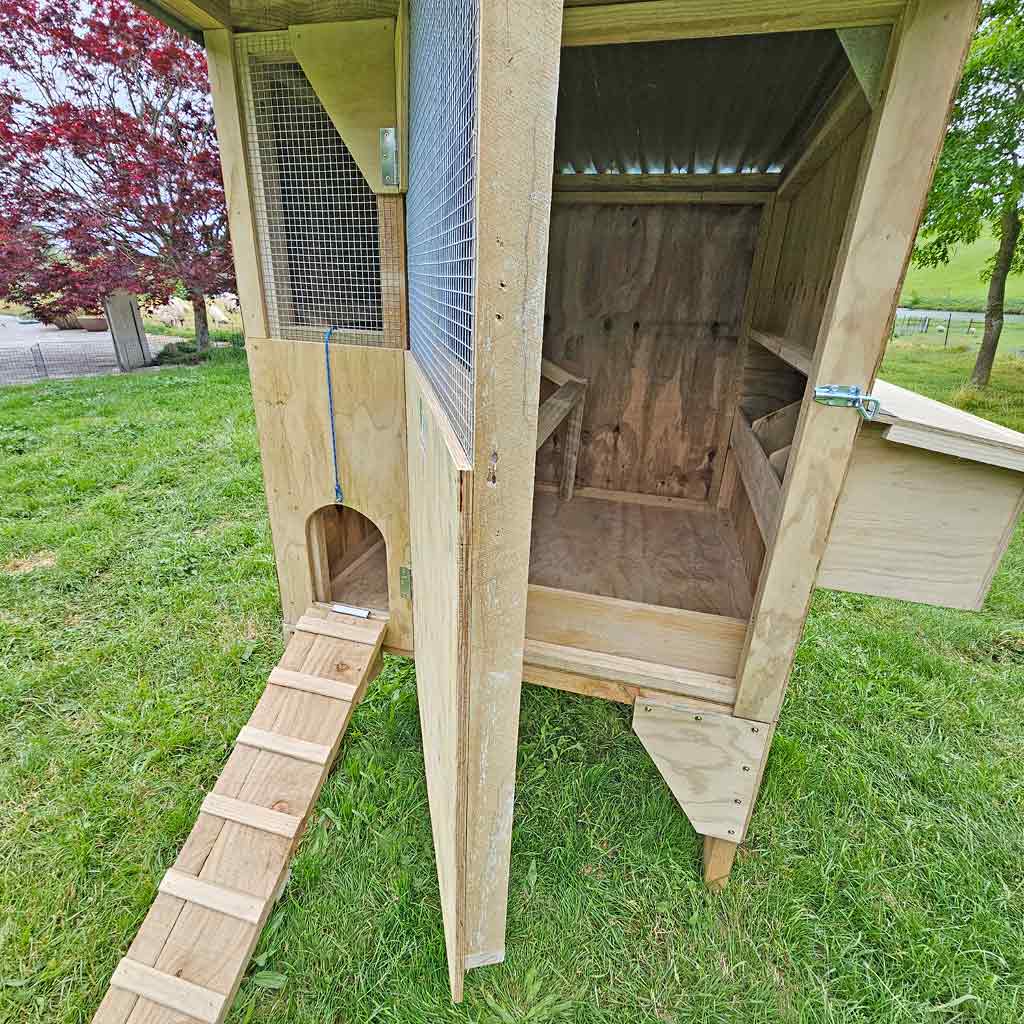 Appletons Timber Raised Cubby Hen House with a good sized door for easy reach and cleaning