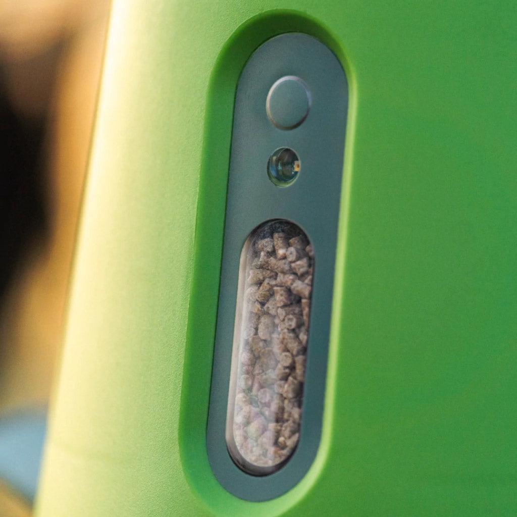The Omlet smart no waste feeder has a window gauge showing the remaining feed level