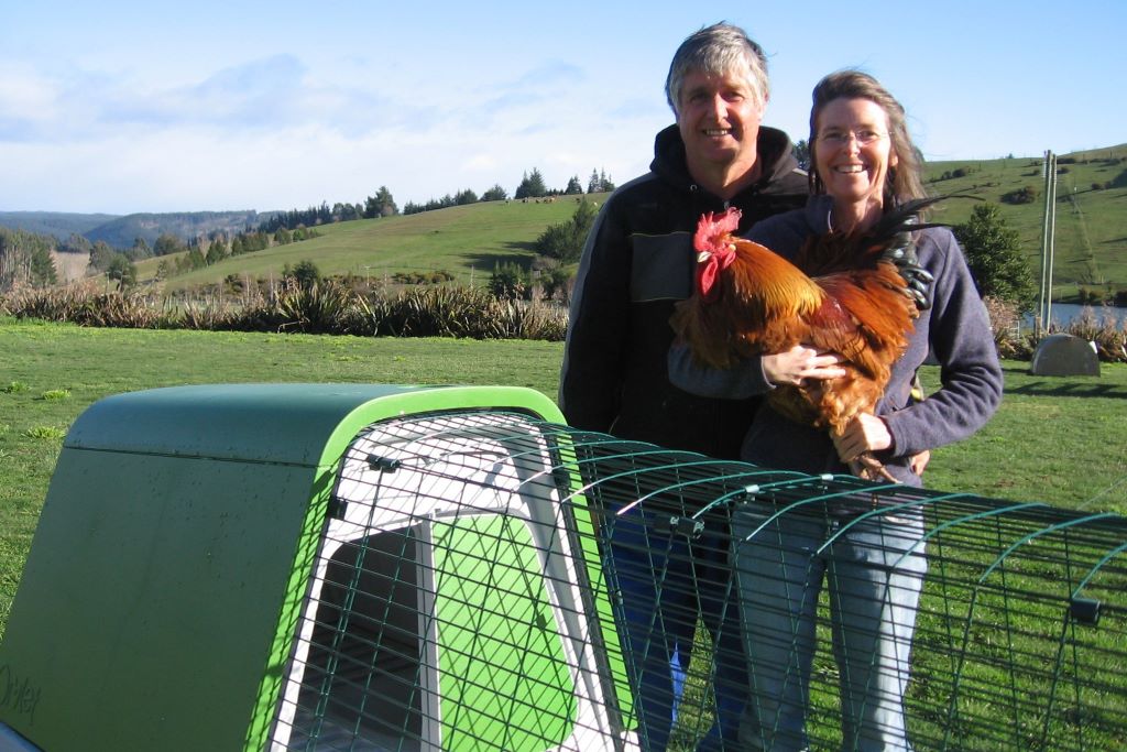 Fionna and Gordon with a Buff Sussex rooster