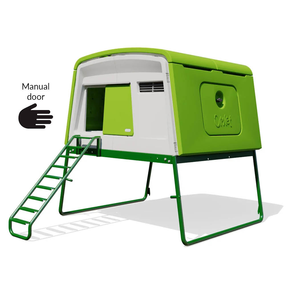 Green Eglu Cube chicken coop with manual door