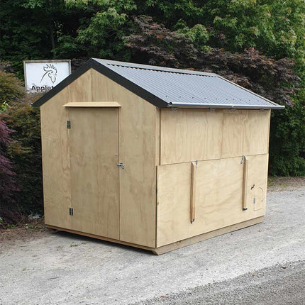 Apex rabbit house with external shutters closed