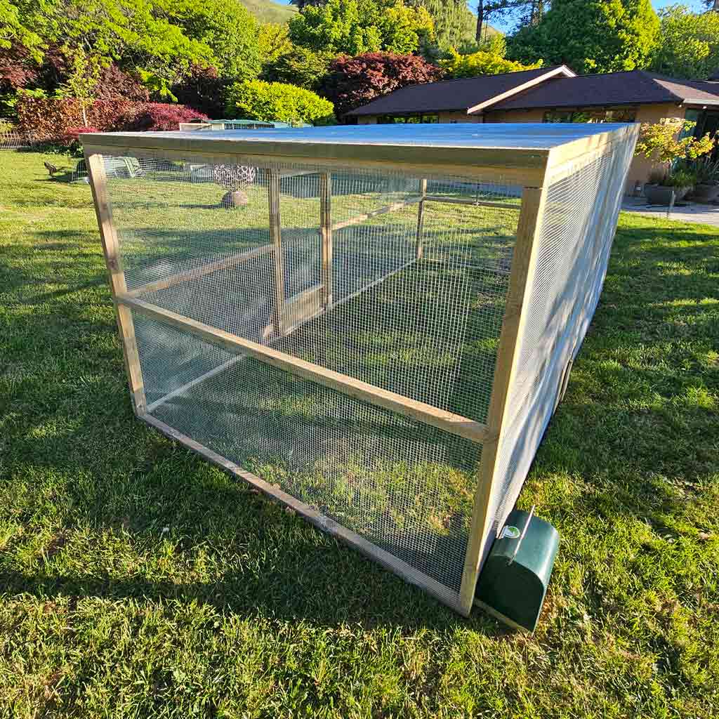 Welded mesh roof panels make the Appletons Freestanding Extended Walk-In Poultry Run fully enclosed