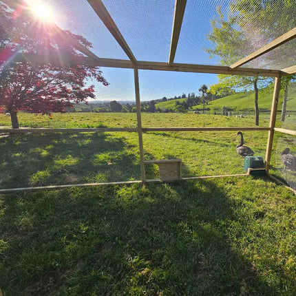 Add a pop-hole for your chickens to free range from our Freestanding Extended Walk-In Poultry Run