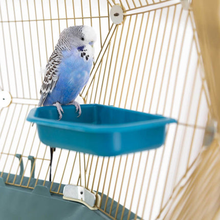 Budgie sitting on the Geo Bird Bath inside the Geo Bird Cage by Omlet