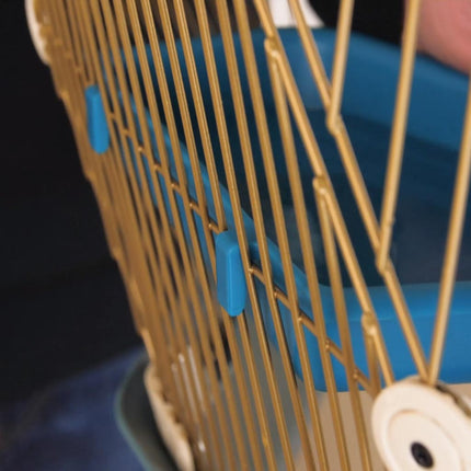 Geo Bird Bath set inside the gold colour Geo cage wire