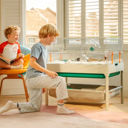 Keep your pet accessories nearby in the handy Storage Basket below your Habitat Cage