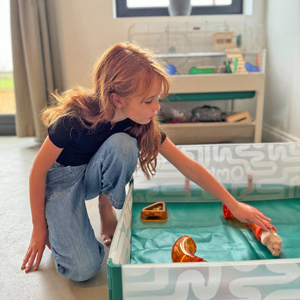 Omlet pop-up playpen with floor connects your children and pets through play