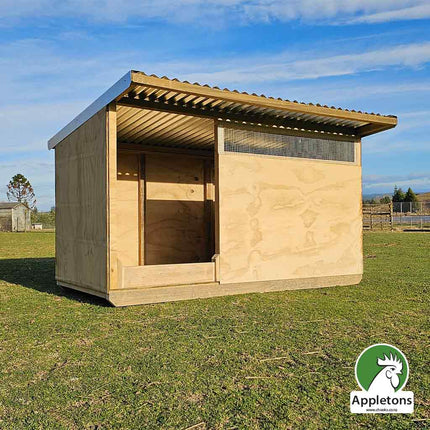 Appletons timber pig shelter with galvanised iron roof and flashings