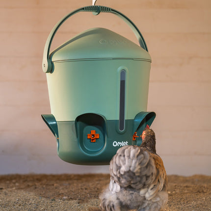 Use the Omlet adjustable hanger to suspend your Omlet insulated chicken drinker in the run