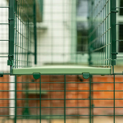 the catio tunnel walkways have a slight curve to ensure rain runs straight off