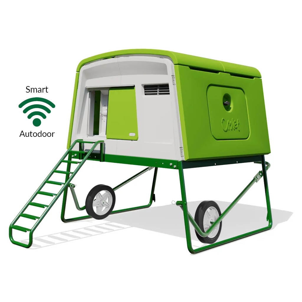 Green Eglu Cube chicken coop with wheels and Smart Autodoor