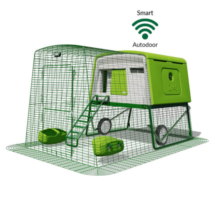 Green Eglu Cube chicken coop with wheels and Smart Autodoor plus 2m run