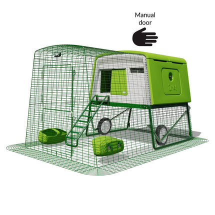Green Eglu Cube chicken coop with wheels and manual door plus 2m run