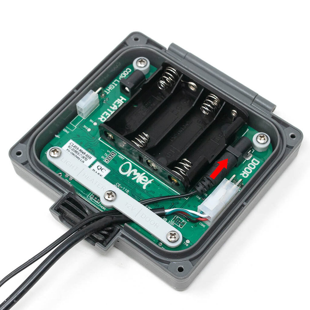 Illustrates where to connect the NZ power adaptor into the control panel of chicken coop autodoor